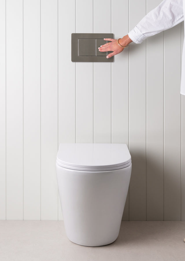 Angled In-Wall Toilet With Rectangle Stainless Steel Buttons