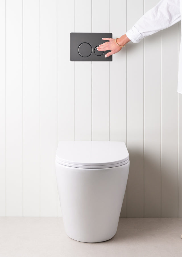 Angled In-Wall Toilet With Round Matte Black Buttons