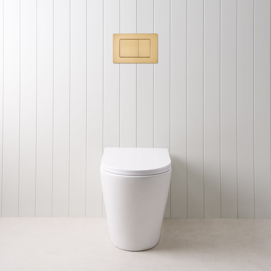 Angled In-Wall Toilet With Rectangle Brushed Brass Buttons