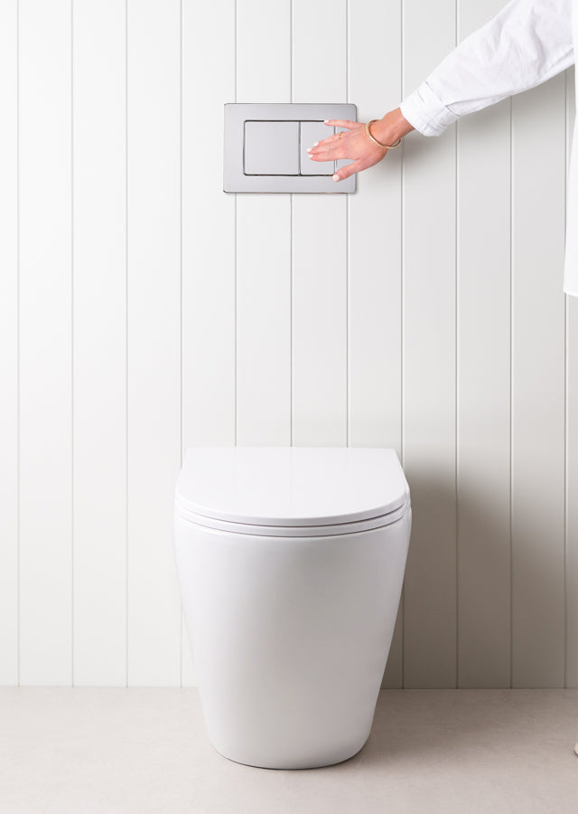 Angled In-Wall Toilet With Rectangle Chrome Buttons