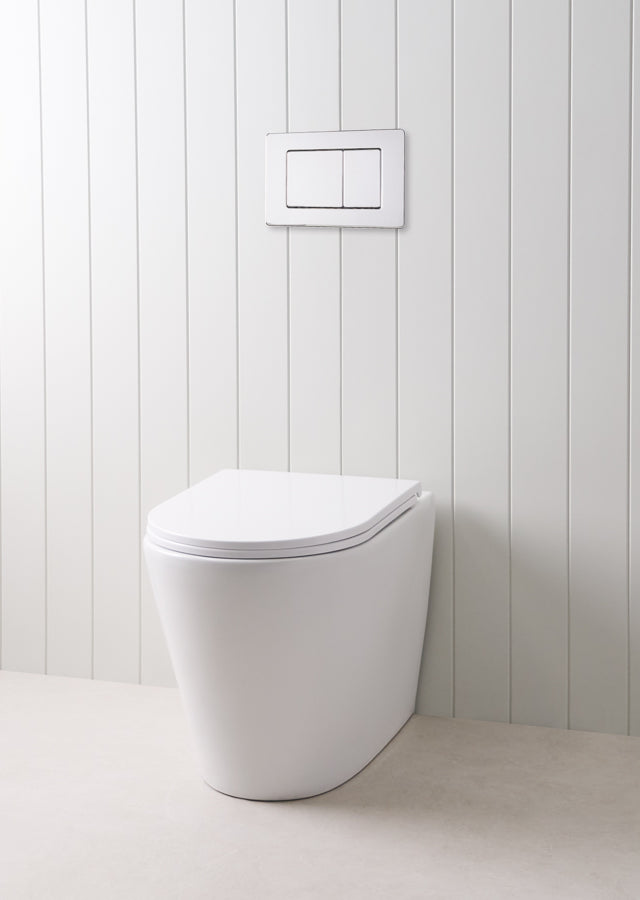 Angled In-Wall Toilet With Rectangle Chrome Buttons