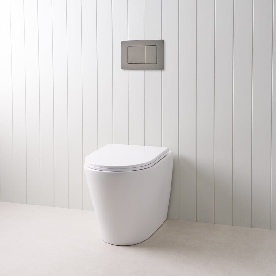 Angled In-Wall Toilet With Rectangle Gunmetal Buttons