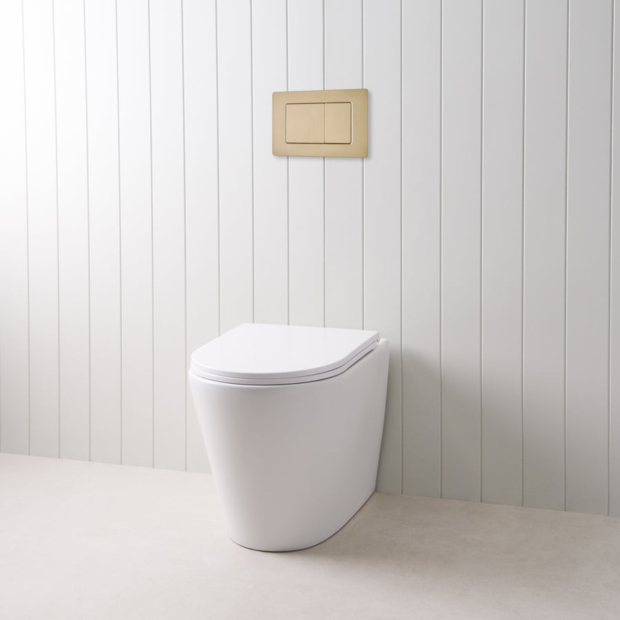 Angled In-Wall Toilet With Rectangle Warm Brushed Nickel Buttons