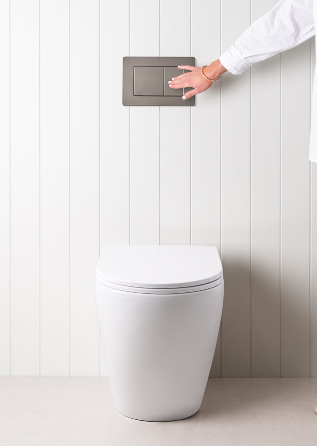 Curved In-Wall Toilet With Rectangle Gunmetal Buttons