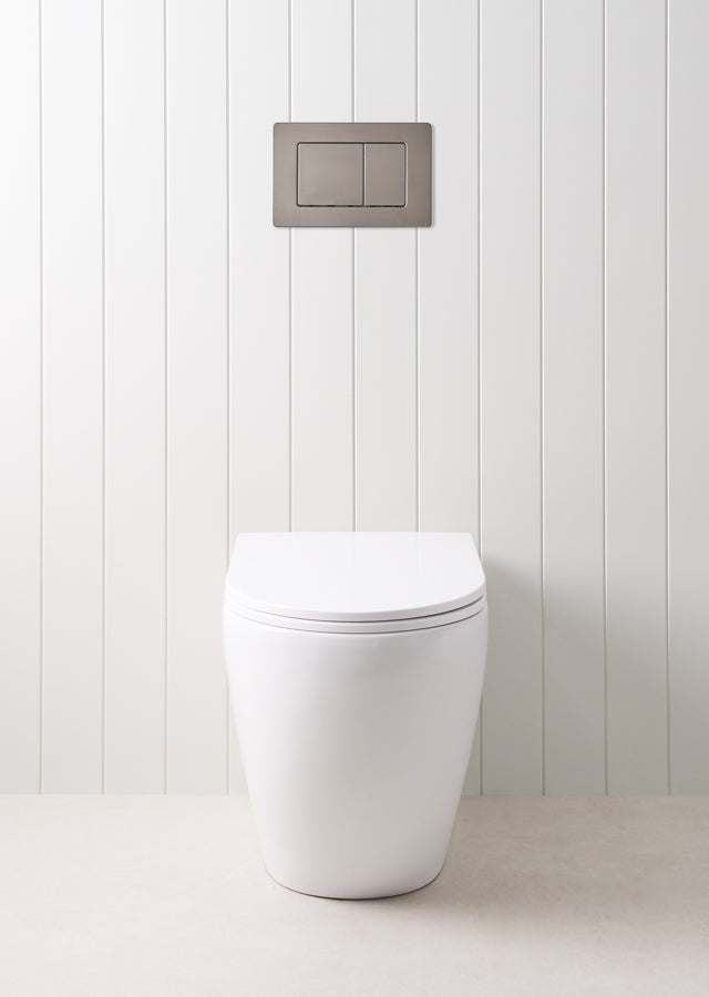 Curved In-Wall Toilet With Rectangle Gunmetal Buttons