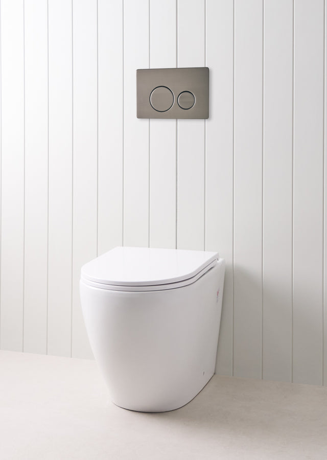 Curved In-Wall Toilet With Round Gunmetal Buttons