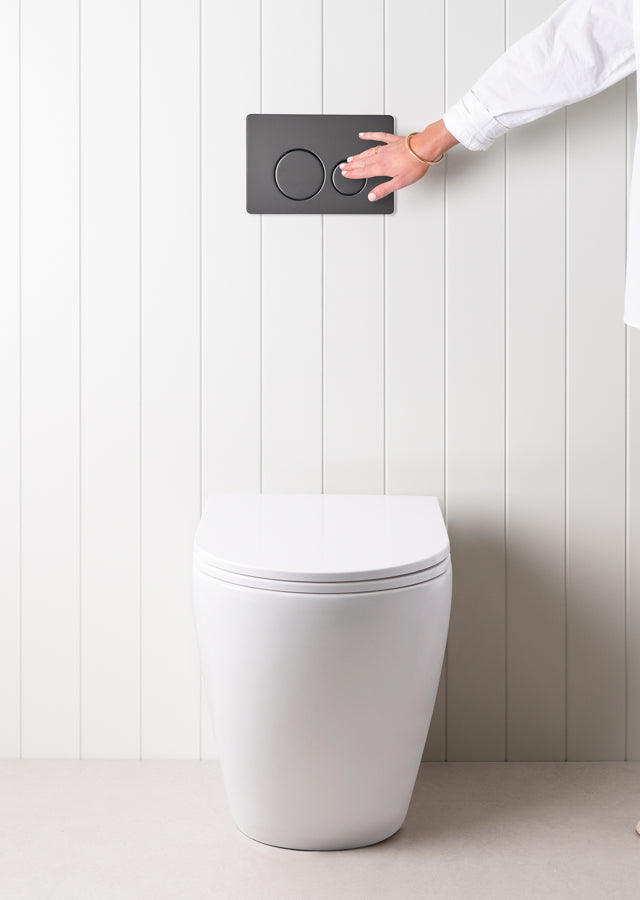 Curved In-Wall Toilet With Round Matte Black Buttons