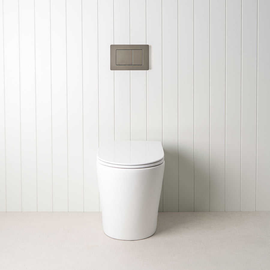 Angled In-Wall Toilet With Rectangle Gunmetal Buttons