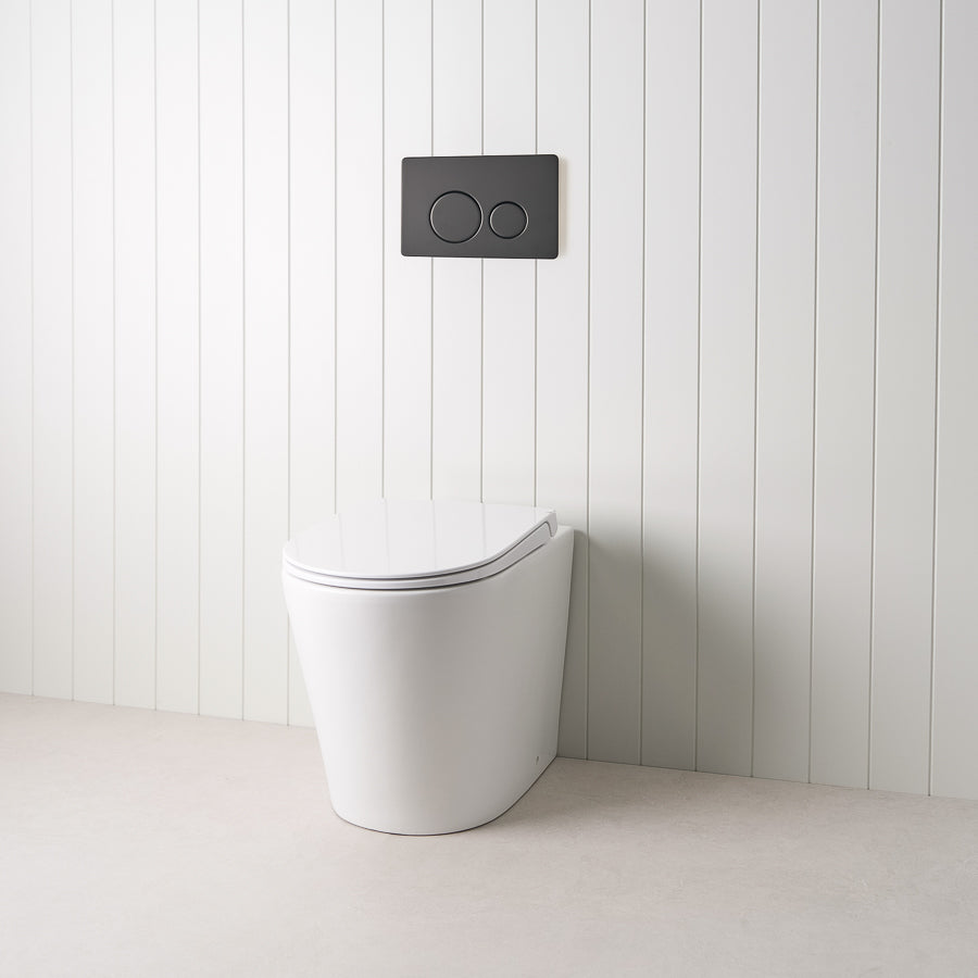 Angled In-Wall Toilet With Round Matte Black Buttons