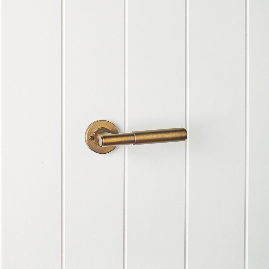 Melbourne Door Handle with Lock Antique Brass