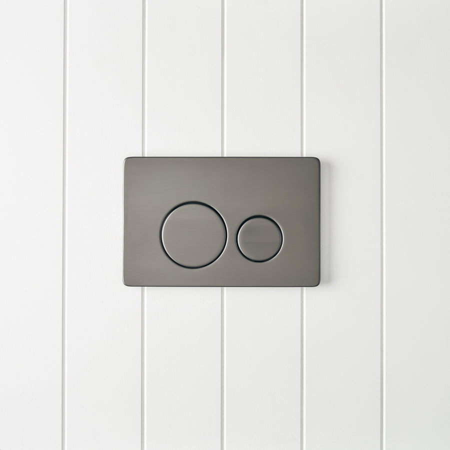 Angled In-Wall Toilet With Round Gunmetal Buttons