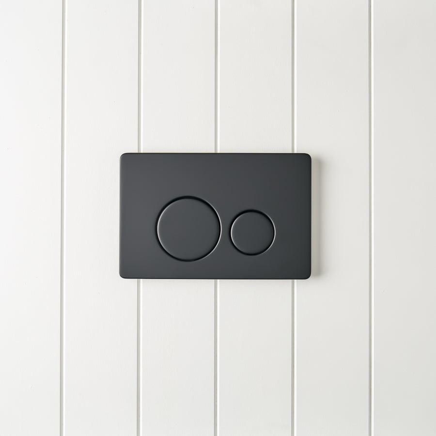Angled In-Wall Toilet With Round Matte Black Buttons